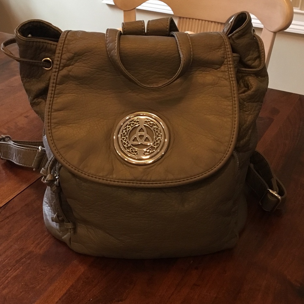 Taupe/khaki green backpack purse. All leather, soft. Quality made. Storage.